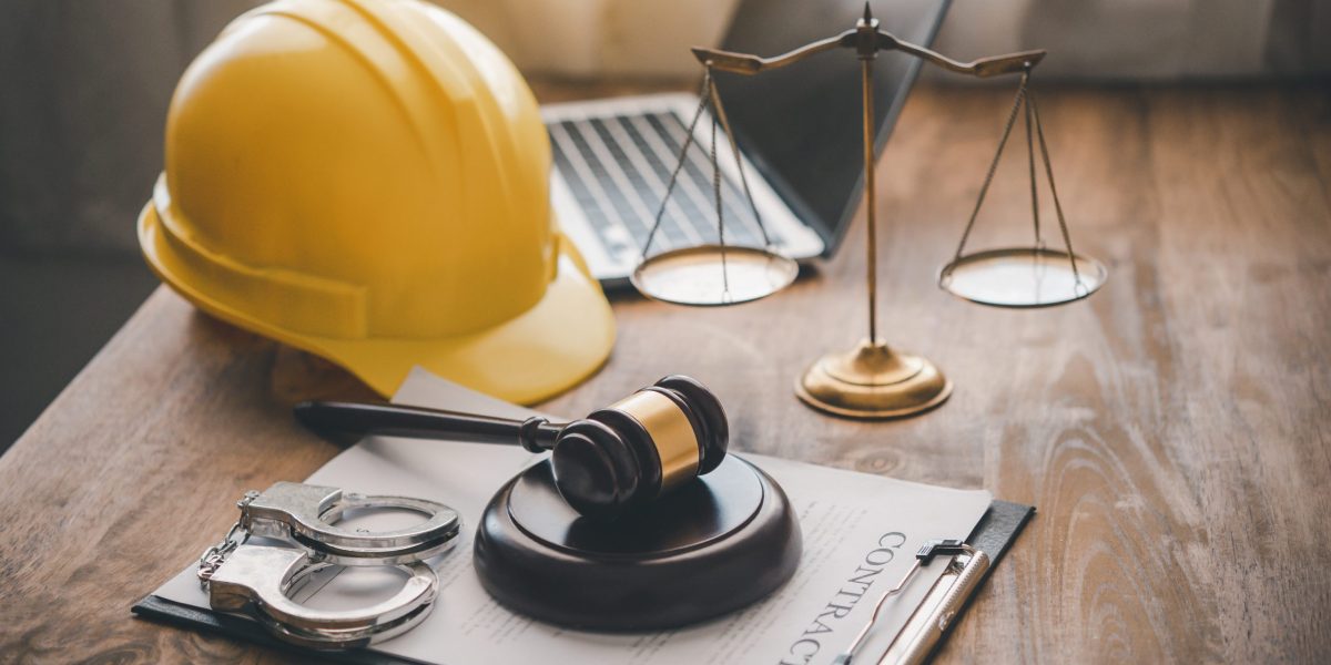 Judge's hammer and helmet Law and Justice about labor law concept Construction law.